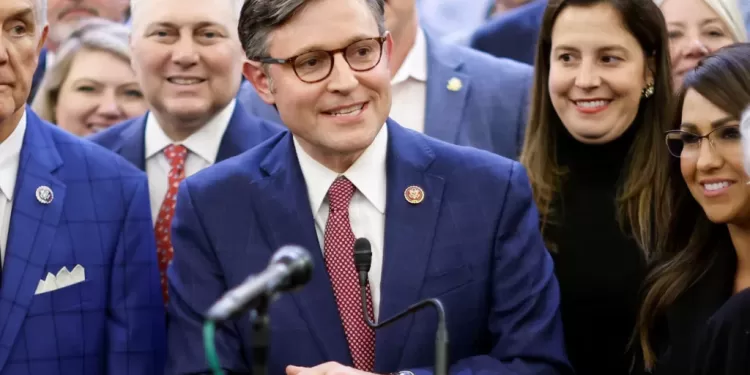 U.S. Representative Mike Johnson (R-LA) is surrounded by fellow members as he speaks to reporters after securing the nomination for House Speaker from the Republican conference on Capitol Hill in Washington, U.S. October 24, 2023.  REUTERS/Jonathan Ernst