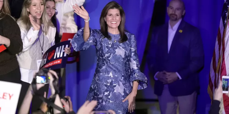 Republican presidential candidate former UN Ambassador Nikki Haley waves to the audience as she takes the stage to speak at a New Hampshire primary night rally, in Concord, N.H., Tuesday Jan. 23, 2024. (AP Photo/Steven Senne)