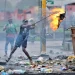 Barricadas, pneus a arder e polícia  em Maputo durante posse de deputados